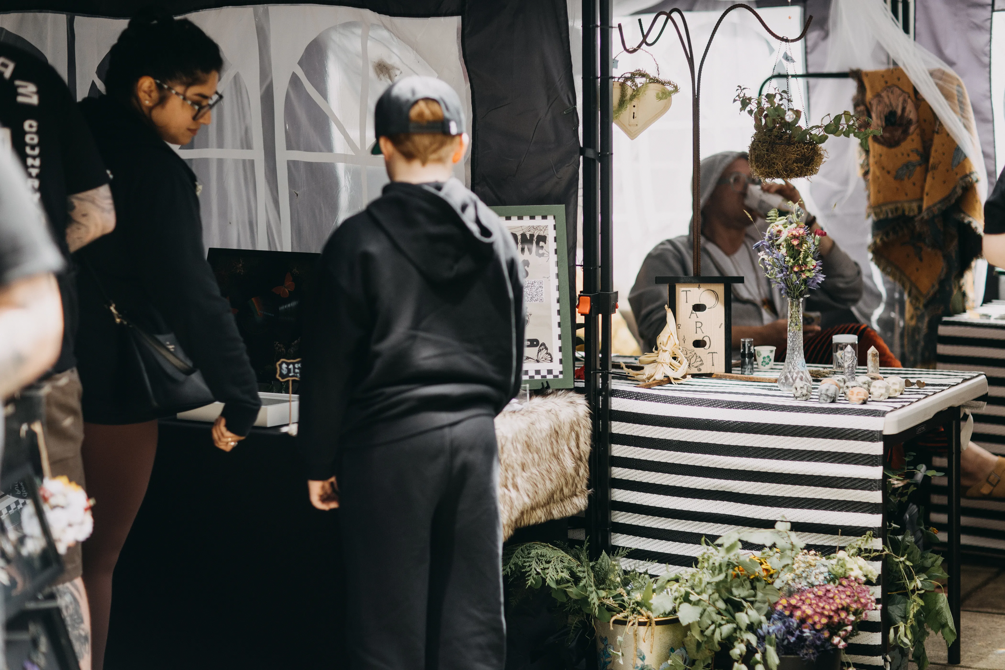Customers perusing custom flower arrangements.
