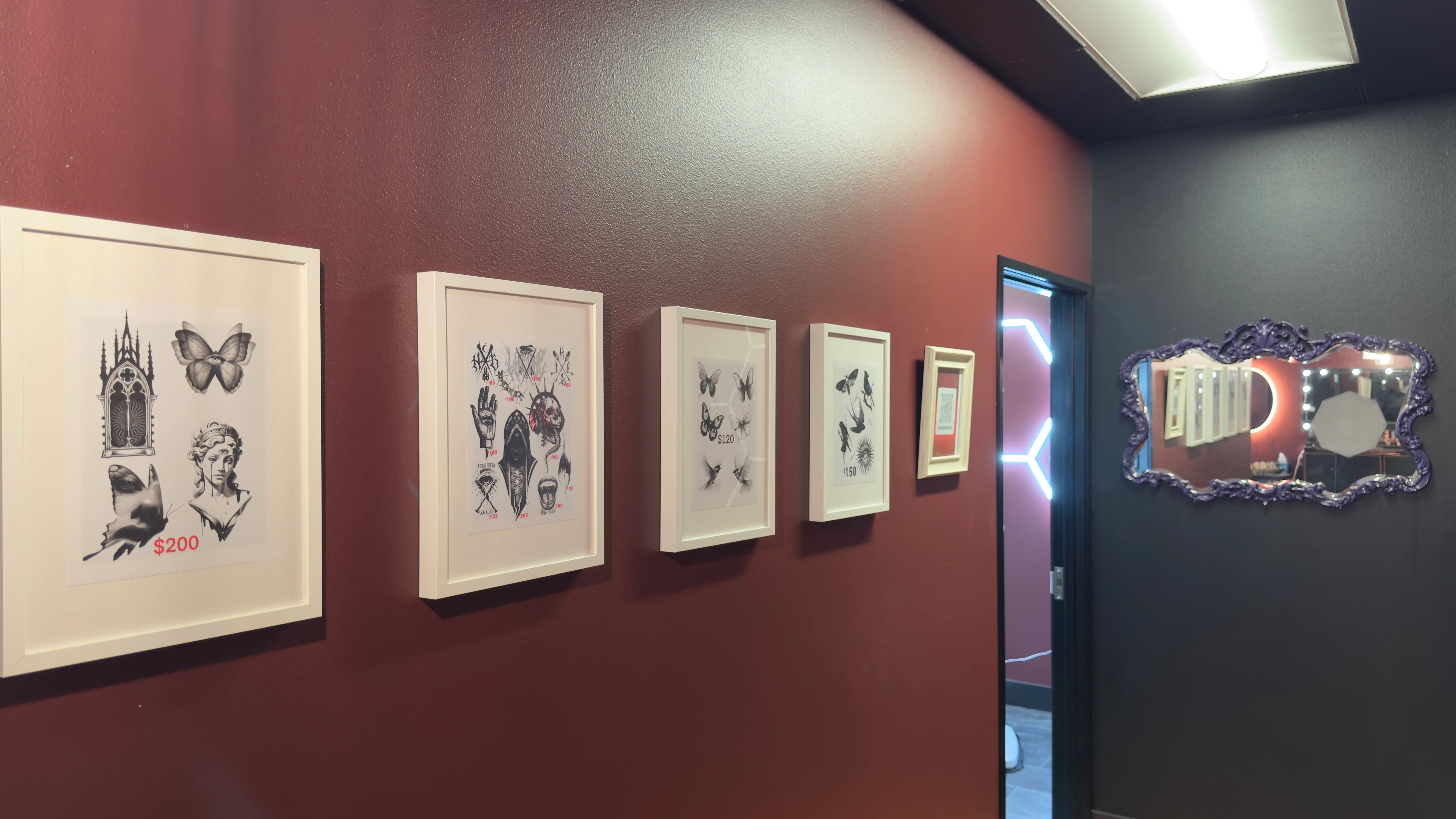 Tattoo flash art displayed on the wall