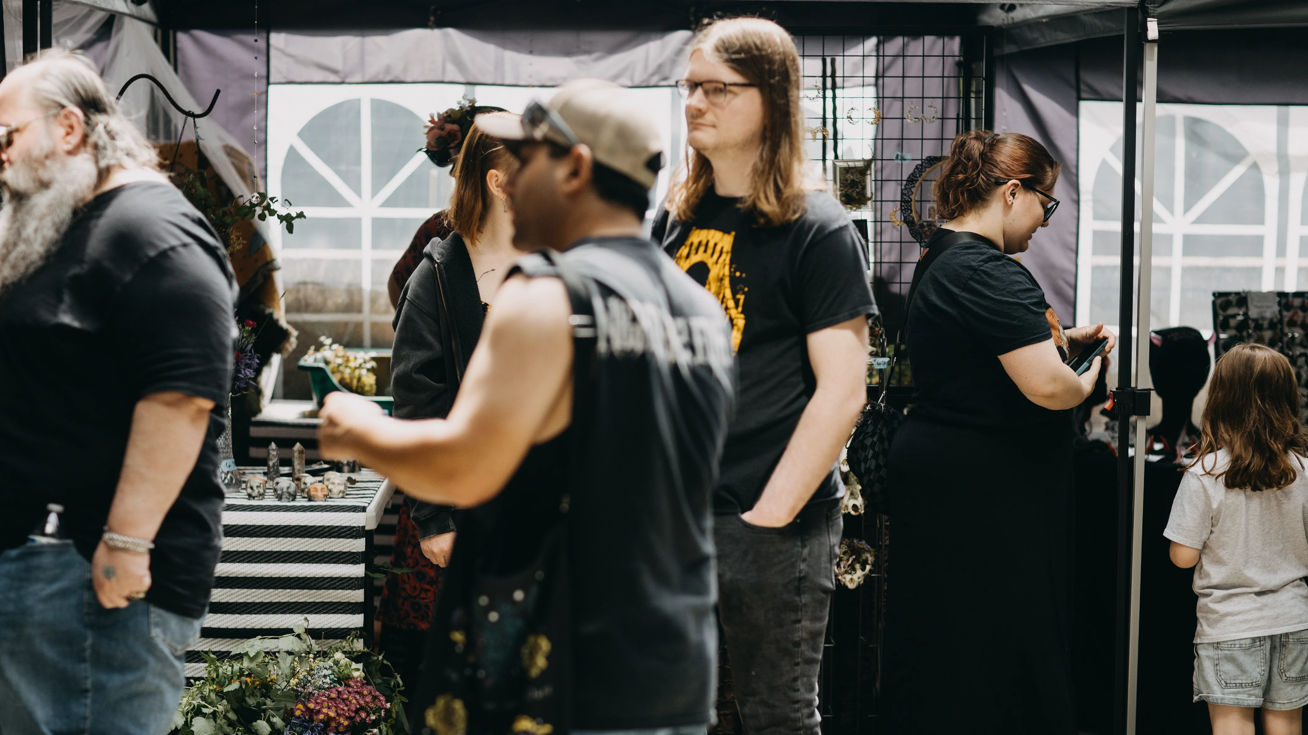 A crowd of customers at the Speakeasy Market vendor faire